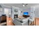 Relaxing living room showcasing a fireplace, hardwood floors, comfortable seating, and a TV at 200 River Landing Dr # D310, Charleston, SC 29492