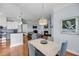 Open-concept living space showcasing kitchen, dining area, and living room with fireplace at 200 River Landing Dr # D310, Charleston, SC 29492
