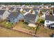 Aerial view of a home featuring a fenced backyard and patio, set within a peaceful neighborhood at 205 Honey Horn Dr, Summerville, SC 29486
