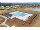 Aerial view of the community pool, recreation areas, and surrounding neighborhood at 205 Honey Horn Dr, Summerville, SC 29486