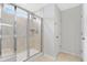 Bathroom featuring a glass-enclosed shower with a bench and a tiled wall at 205 Honey Horn Dr, Summerville, SC 29486