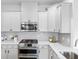 Modern kitchen with white cabinets, stainless steel appliances, and white subway tile backsplash at 205 Honey Horn Dr, Summerville, SC 29486