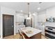 Updated kitchen with a center island, stainless steel appliances, and modern cabinetry at 205 Honey Horn Dr, Summerville, SC 29486