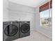 Laundry room features washer and dryer at 205 Honey Horn Dr, Summerville, SC 29486
