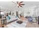 Open-concept living space with dining area, modern decor, and plenty of natural light at 205 Honey Horn Dr, Summerville, SC 29486