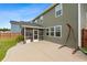 An ample patio with a screened-in porch and room to relax or entertain guests at 205 Honey Horn Dr, Summerville, SC 29486