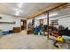 Large basement area with exposed ceiling beams, offering storage or workspace at 2144 Pinopolis Rd, Pinopolis, SC 29469