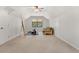 Lofted bonus room featuring light colored walls, carpet, and natural light at 2144 Pinopolis Rd, Pinopolis, SC 29469