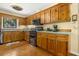 The kitchen has wooden cabinets, modern appliances and durable countertops at 2144 Pinopolis Rd, Pinopolis, SC 29469