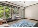 Bright sunroom with large windows and a door offering views and access to the outdoors at 2144 Pinopolis Rd, Pinopolis, SC 29469