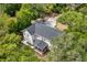 Aerial view of the property showcasing the home's layout, landscaping, and surrounding greenery at 2159 Parkway Dr, Charleston, SC 29412