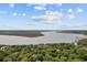 Breathtaking aerial view of a lush, green landscape with a tranquil river winding through the scenery at 2159 Parkway Dr, Charleston, SC 29412