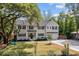 Charming two-story home featuring a well-maintained lawn and traditional architectural details at 2159 Parkway Dr, Charleston, SC 29412