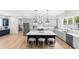 Modern kitchen with a large island, stainless steel appliances, and stylish pendant lighting at 2159 Parkway Dr, Charleston, SC 29412