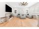 Cozy living room with a ceiling fan, fireplace, and comfortable seating at 2159 Parkway Dr, Charleston, SC 29412