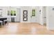 Open-concept living space featuring hardwood floors and modern design elements at 2159 Parkway Dr, Charleston, SC 29412