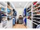 Spacious walk-in closet featuring custom built-in shelving and hanging racks for optimal organization at 2159 Parkway Dr, Charleston, SC 29412