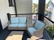 Outdoor seating area on a balcony with comfortable chair and loveseat at 22A Corinne St # 31, Charleston, SC 29403