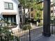 View of the courtyard between properties from a balcony with decorative columns at 22A Corinne St # 31, Charleston, SC 29403
