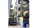 Modern home featuring balconies with black railing, a garage and off-street parking at 22A Corinne St # 31, Charleston, SC 29403