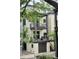 Charming three-story home with multiple balconies and garage access, perfect for city living at 22A Corinne St # 31, Charleston, SC 29403
