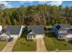 An aerial view showcases this home with lush lawns and mature trees at 221 Lucca Dr, Summerville, SC 29486
