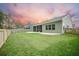 Expansive backyard with lush lawn, patio, and privacy fence providing a peaceful outdoor space at 221 Lucca Dr, Summerville, SC 29486