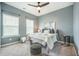 Serene bedroom boasts natural light and a calm color palette for relaxation and rest at 221 Lucca Dr, Summerville, SC 29486