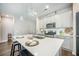 Modern kitchen with stainless steel appliances, a large island, and pendant lighting at 221 Lucca Dr, Summerville, SC 29486