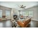 Cozy living room featuring a fireplace, hardwood floors, and ample seating at 221 Lucca Dr, Summerville, SC 29486