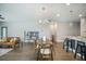 Open-concept living space with a dining area, living room, and kitchen, perfect for entertaining at 221 Lucca Dr, Summerville, SC 29486