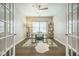 Bright home office offering a comfortable chair, stylish desk, and soft rug at 221 Lucca Dr, Summerville, SC 29486