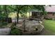 Multi-level deck with built-in seating, lovely flowers, and access to the main house at 228 Dogwood Trl, Harleyville, SC 29448