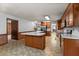 Open kitchen with stainless steel appliances, center island, and ample cabinet space at 228 Dogwood Trl, Harleyville, SC 29448