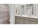 Bathroom features a double vanity and shower with neutral toned colors at 244 Wild Strawberry Ln, Moncks Corner, SC 29461