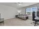 Bedroom featuring a ceiling fan, futon, gaming chair and a window at 244 Wild Strawberry Ln, Moncks Corner, SC 29461