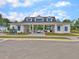 Community clubhouse featuring a pool, stylish architecture and blue shutters at 244 Wild Strawberry Ln, Moncks Corner, SC 29461