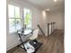 Well-lit room with a desk, chair, and large windows offering pleasant views for a productive workspace at 2508 Corona St, North Charleston, SC 29405
