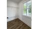 Walk-in closet with wire shelving and a window offering natural light and an open view at 2508 Corona St, North Charleston, SC 29405