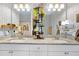 Bathroom featuring granite countertops, double vanity, stylish fixtures and modern design at 255 S Railroad Ave, Ridgeville, SC 29472