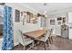 Dining room area with dining table and curated decor with natural lighting at 255 S Railroad Ave, Ridgeville, SC 29472
