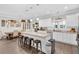 Spacious kitchen with white cabinets, a large island, and modern appliances at 255 S Railroad Ave, Ridgeville, SC 29472