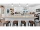 Kitchen island with seating and granite countertop, open concept kitchen at 255 S Railroad Ave, Ridgeville, SC 29472