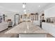 Open concept kitchen with a large island and combined dining and living areas at 255 S Railroad Ave, Ridgeville, SC 29472