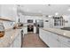 Modern kitchen featuring stainless steel appliances and white cabinets and lots of light at 255 S Railroad Ave, Ridgeville, SC 29472