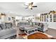 Open concept living area combining a modern kitchen with a spacious living room at 255 S Railroad Ave, Ridgeville, SC 29472
