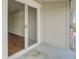 Private balcony featuring a sliding door, ample space and a peek into the home's interior, plus outdoor seating at 259 E Bay St # 7C, Charleston, SC 29401
