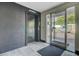 Hallway with elevator access and doorway to parking area at 259 E Bay St # 7C, Charleston, SC 29401