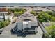 An aerial view showcasing parking and building's entry with inviting covered porch at 259 E Bay St # 7C, Charleston, SC 29401