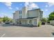 The exterior view of this building highlights its well-maintained facade, porch, and convenient parking at 259 E Bay St # 7C, Charleston, SC 29401